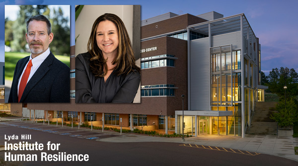Dr. Chip Benight and Nicole Weis in front of the Lane Center