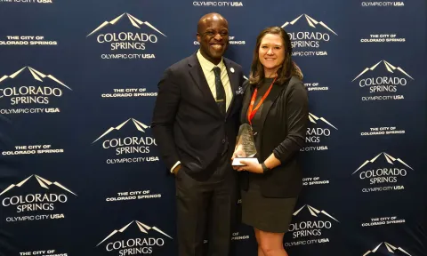 Photo of Nicole Weis with Mayor Mobolade